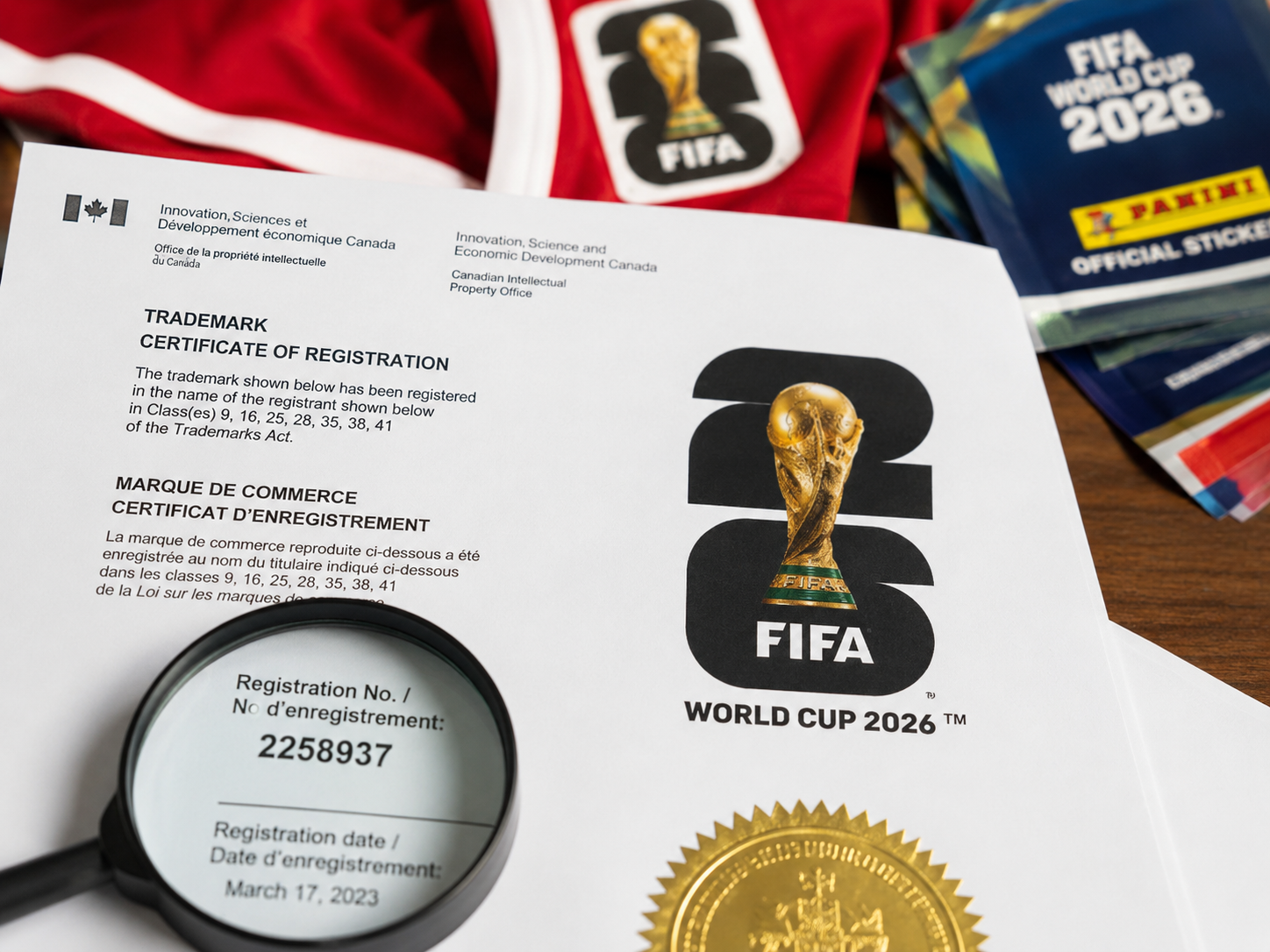 Official World Cup 2026 emblem and trademark document on a desk.