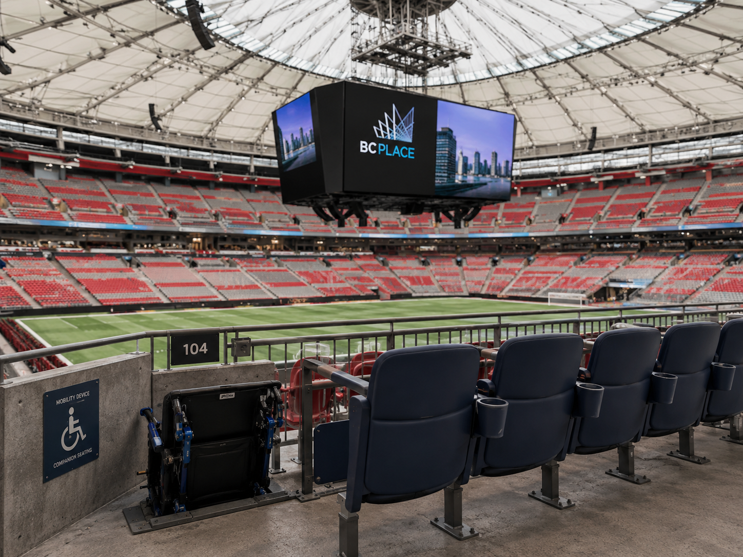 Future-focused interior of BC Place Stadium showing video board and accessibility seating.